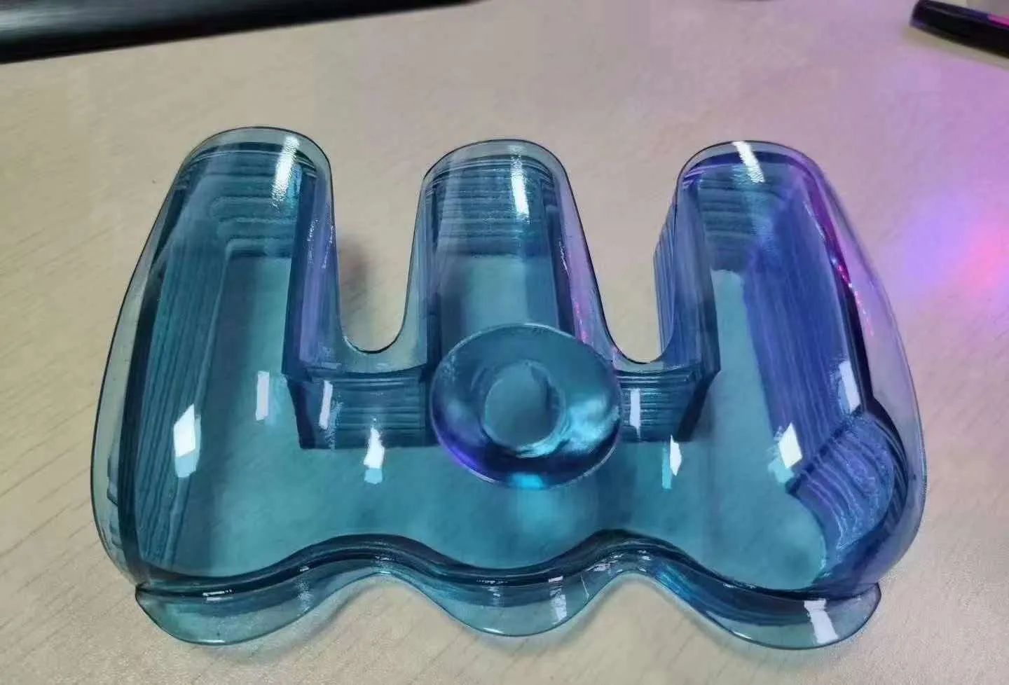 Finished transparent 3D printed part with hand-painted finish